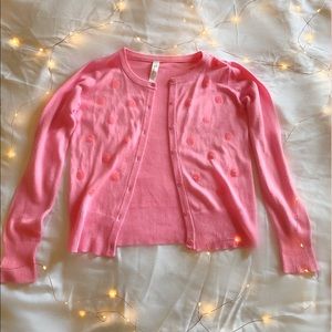 pink button up sweater